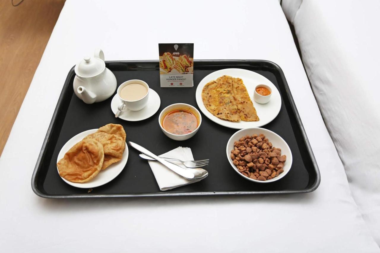 โอโย 67033 โฮเต็ล ซาฮิล พลาซา Hotel Una  ภายนอก รูปภาพ